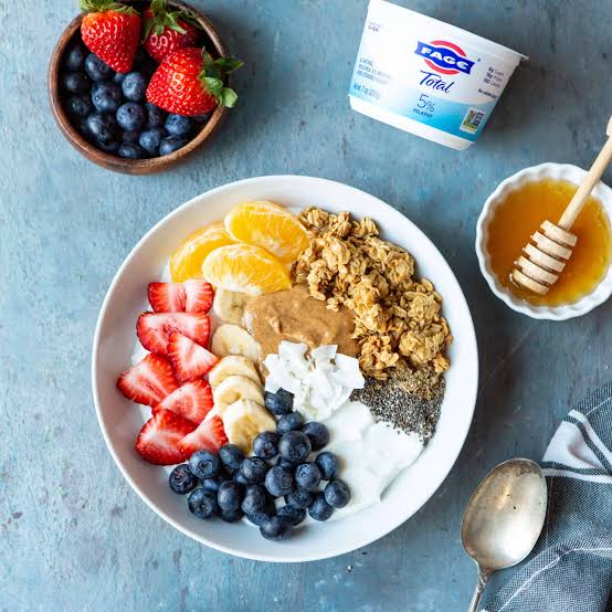 Gut healthy breakfast bowl with yogurt and berries
